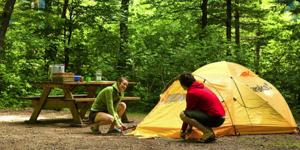 setting up camping tent